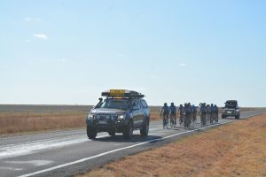 Escort vehicle leading riders during the Cairns to Karumba Bike Ride